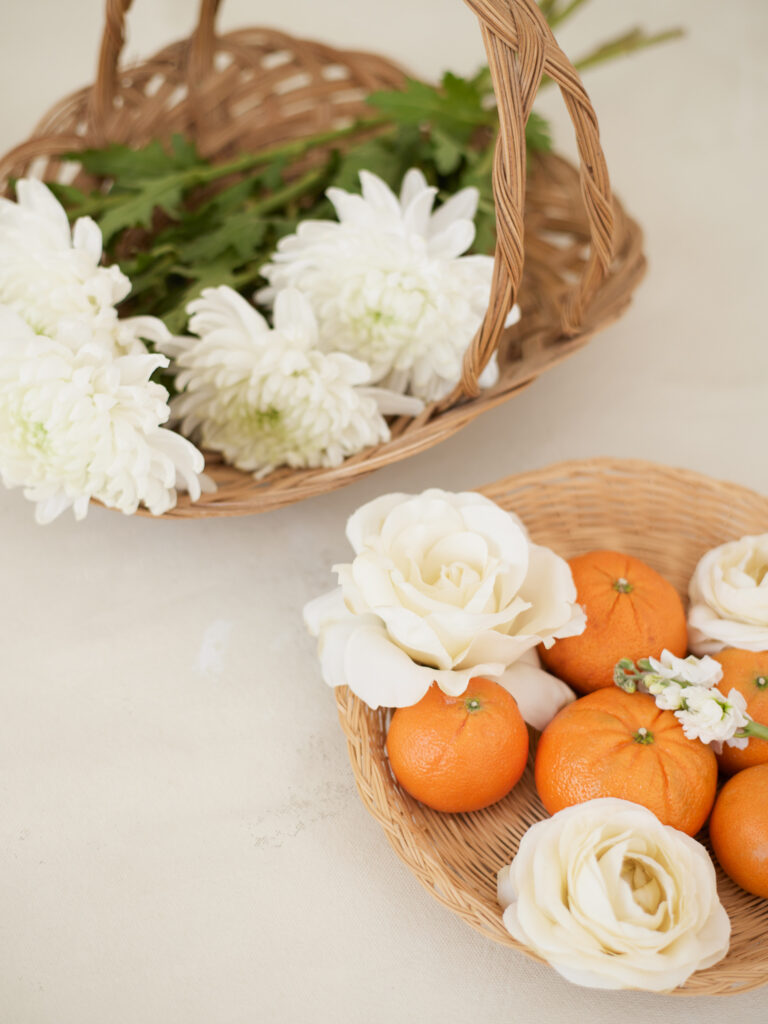Chicago dol detail image of traditional Korean first birthday setup with flowers and fruit styling in soft light